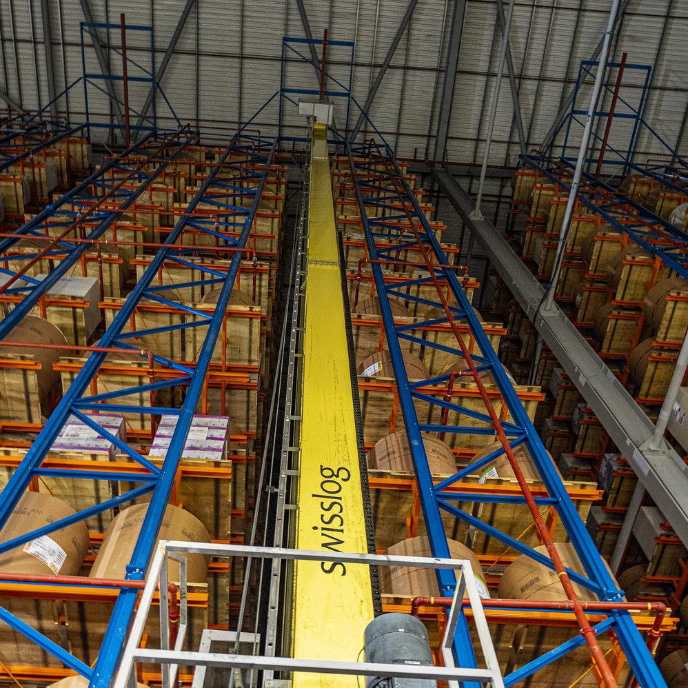 A paper terminal warehouse showcasing our modern robotics storage facility